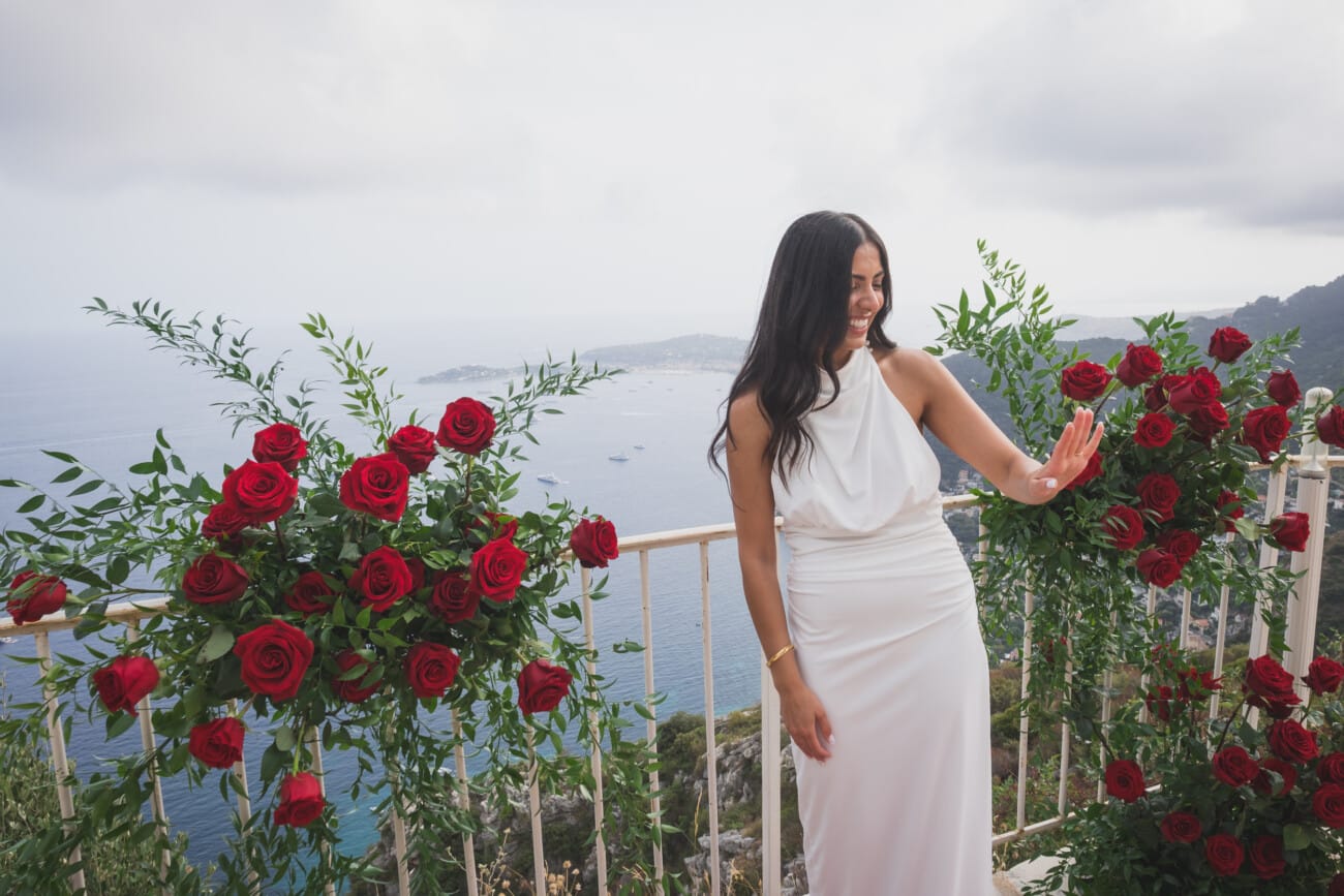 Chateau Chevre d'Or Eze, intimate proposal  With red roses floral setup in the private garden overlooking the French Riviera
French Riviera Proposal planning and Photography WildRoses