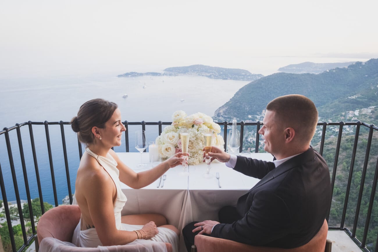 French Riviera Elopement Photographer — Crafting Intimate and Elegant Love Stories 6 Elegant dinner on a privatised balcony on 1-star restaurant Chateau Eza overlooking the French Riviera