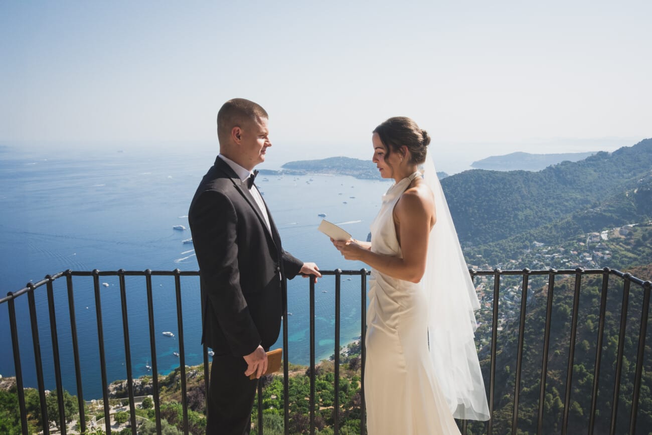Intimate elopement vows on balcony at Château Eza overlooking French Riviera
