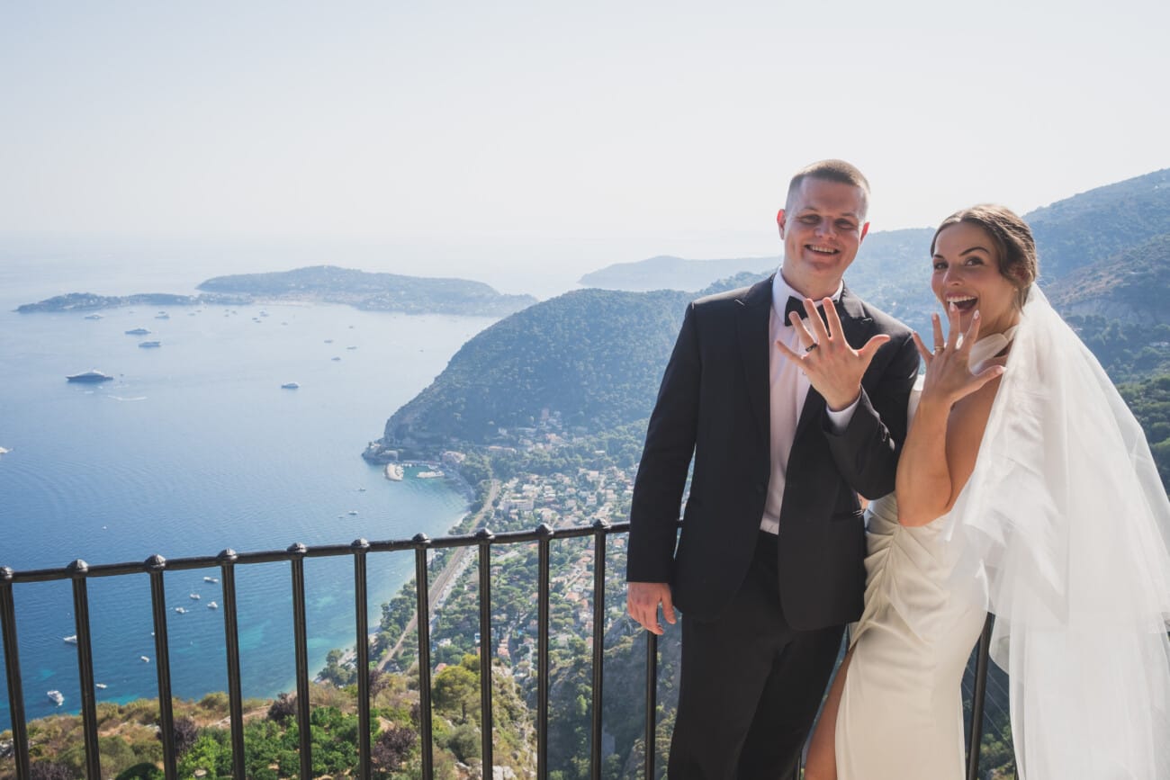 Intimate  Elopement ceremony exchanging vows overlooking the French Riviera coastline from Chateau Eza