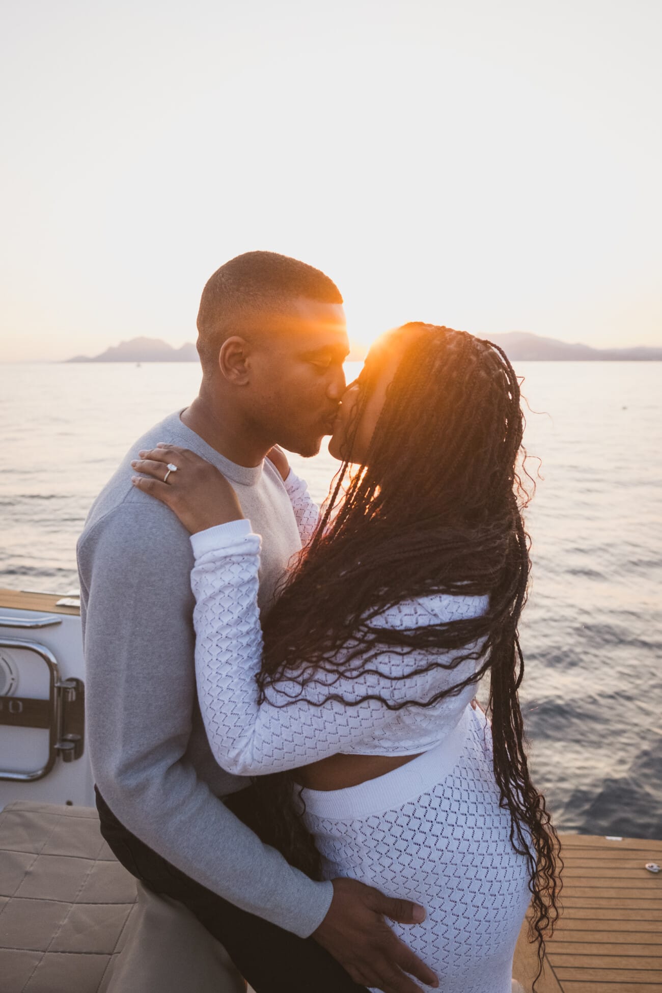 A Romantic Proposal on a Yacht between the Lérins Islands 25 Couple kissing on a yacht, after an intimate French Riviera Yacht proposal near Cannes.
Planning and Photography by WildRoses Studio.