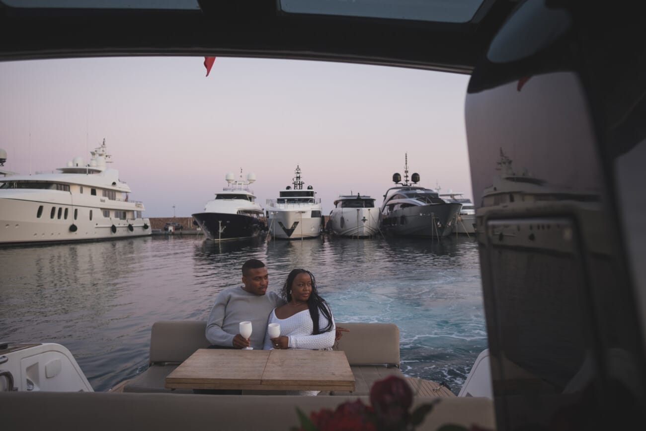 A Romantic Proposal on a Yacht between the Lérins Islands 27 Couple enjoying sunset on yacht after an intimate French Riviera Yacht proposal near Cannes.
Planning and Photography by WildRoses Studio.