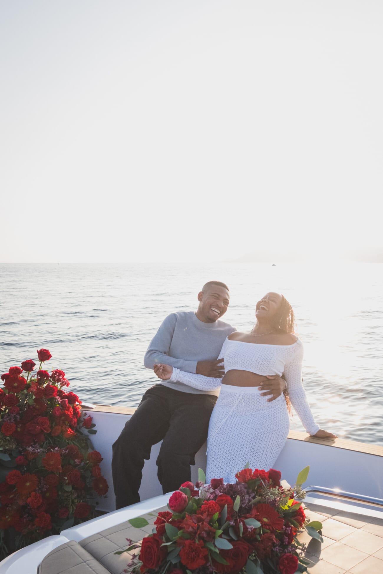 A Romantic Proposal on a Yacht between the Lérins Islands 13 Pure joy and laughter after getting engaged on a yacht on the French Riviera.
Proposal planning and Photography WildRoses Studio